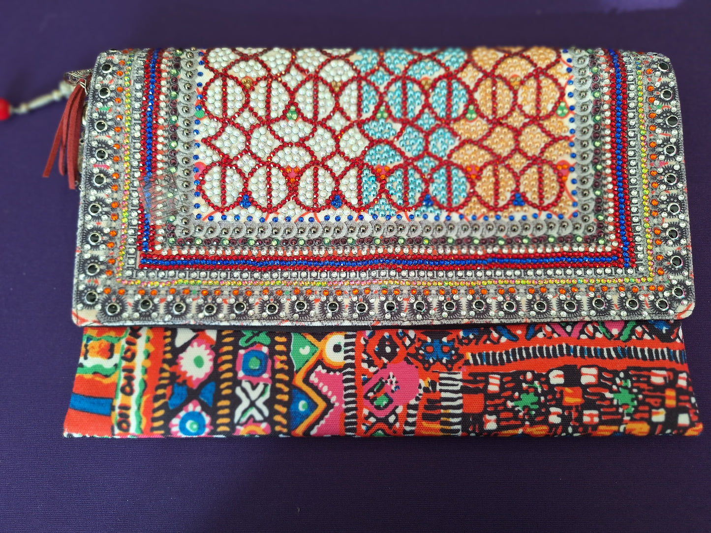 INÒA Embellished clutch